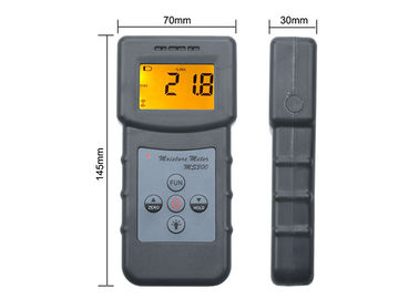 Grauer Analysator-Handhygrometer, das auf konkrete Böden prüft